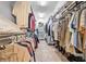Organized walk-in closet with ample hanging and storage space at 1766 Roscoe Turner Trl, Port Orange, FL 32128