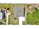 Birds eye view shows the layout of the house, the yard, and the position of the car in the driveway at 3828 S Atlantic Ave, Daytona Beach, FL 32118