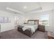 Well-lit bedroom boasts an ensuite bathroom and ample natural light at 3828 S Atlantic Ave, Daytona Beach, FL 32118