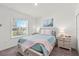 Comfortable bedroom with soft colors, natural light, and stylish furnishings create a calming retreat at 3828 S Atlantic Ave, Daytona Beach, FL 32118