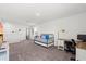 View of a spacious bonus room with a daybed and workspace area at 3828 S Atlantic Ave, Daytona Beach, FL 32118