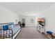 Bonus room features flexible living space with a desk and comfortable daybed at 3828 S Atlantic Ave, Daytona Beach, FL 32118