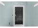 Inviting front door with a beach house sign at 3828 S Atlantic Ave, Daytona Beach, FL 32118
