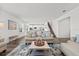 Bright, open living room featuring modern decor, sleek flooring, and abundant natural light at 3828 S Atlantic Ave, Daytona Beach, FL 32118