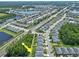 Aerial shot of the neighborhood showcasing proximity to a lake, highway, and green space at 5539 Estero Loop, Port Orange, FL 32128