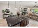 Kitchen with granite countertops, stainless steel dishwasher and views of adjacent dining and living area at 5539 Estero Loop, Port Orange, FL 32128