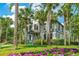 Historic Stetson University building with palm trees and a beautifully landscaped lawn at 603 W Miles St, Deland, FL 32720