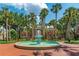 Tranquil Stetson University fountain, surrounded by palm trees and brick pathways at 603 W Miles St, Deland, FL 32720