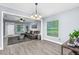 Open concept living room showing a dining room, living room, and modern design at 603 W Miles St, Deland, FL 32720