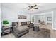 Bright living room with an open layout, featuring comfortable seating and modern décor at 603 W Miles St, Deland, FL 32720