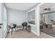 Cozy sitting area featuring light gray walls, modern furniture, and stylish decor at 603 W Miles St, Deland, FL 32720