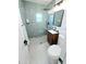 Updated bathroom with a walk-in shower, sleek fixtures, and modern decor at 68 Hibiscus Dr, Ormond Beach, FL 32176