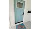 Stylish front door with unique glass detailing and a welcoming doormat that says 'Good Vibes' at 68 Hibiscus Dr, Ormond Beach, FL 32176