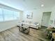 Bright living room features a cozy couch, beach themed decorations, and plenty of natural light at 68 Hibiscus Dr, Ormond Beach, FL 32176