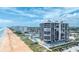 An aerial view of the condo situated beachfront near shopping and restaurant areas at 1239 Ocean Shore Blvd # 11D, Ormond Beach, FL 32176
