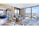Bright open floorplan features a living room with ocean views and comfortable seating at 1239 Ocean Shore Blvd # 11D, Ormond Beach, FL 32176