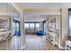 Bright living room featuring wood floors, modern furniture, and stunning views at 1239 Ocean Shore Blvd # 11D, Ormond Beach, FL 32176