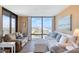 Bright open floorplan features a living room with ocean views and comfortable seating at 1239 Ocean Shore Blvd # 11D, Ormond Beach, FL 32176