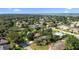 An aerial view showcasing a peaceful neighborhood surrounded by lush greenery at 1317 Northside Dr, Ormond Beach, FL 32174
