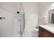 Bathroom featuring a walk-in shower and wood vanity cabinet with drawers, countertop, sink, and chrome faucet at 1317 Northside Dr, Ormond Beach, FL 32174