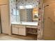 Well-maintained bathroom featuring a vanity with a sink and a glass-enclosed shower at 16 Hunt Master Ct, Ormond Beach, FL 32174