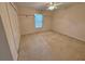 Bedroom with a window and closet, offering ample space and storage with neutral walls and carpeted floor at 16 Hunt Master Ct, Ormond Beach, FL 32174