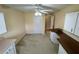 Bonus room featuring a carpeted floor, a built-in desk area, and natural lighting at 16 Hunt Master Ct, Ormond Beach, FL 32174