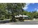 Community clubhouse featuring well-kept landscaping and a covered entrance at 16 Hunt Master Ct, Ormond Beach, FL 32174