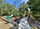 Community playground area with swings and play equipment at 16 Hunt Master Ct, Ormond Beach, FL 32174