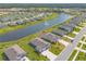 New construction home with a pool being built in a desirable community featuring a pond with a fountain at 2840 Monaghan Dr, Ormond Beach, FL 32174