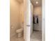 A powder room adjacent to a closet, showcasing modern fixtures and ample storage at 2840 Monaghan Dr, Ormond Beach, FL 32174