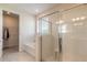 Bright bathroom featuring a soaking tub and walk-in shower with glass enclosure at 2840 Monaghan Dr, Ormond Beach, FL 32174