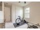 Neutral bedroom featuring a closet, a window, and space for fitness with indoor bicycle at 2840 Monaghan Dr, Ormond Beach, FL 32174
