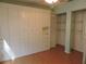 Spacious bedroom with large closet and attached dressing area with storage shelves at 543 Sandy Oaks Blvd, Ormond Beach, FL 32174