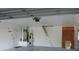 Spacious garage with water heater, air handler, and ample storage space at 543 Sandy Oaks Blvd, Ormond Beach, FL 32174