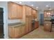 Spacious kitchen featuring granite countertops, stainless steel appliances, and ample cabinet space at 543 Sandy Oaks Blvd, Ormond Beach, FL 32174