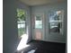 Bright room with carpet and outdoor access at 543 Sandy Oaks Blvd, Ormond Beach, FL 32174