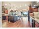 Spacious kitchen featuring a center island with bar seating, custom cabinetry, and an open layout at 568 Luna Bella Ln, New Smyrna Beach, FL 32168