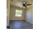 Comfortable bedroom with light, neutral paint and modern flooring offering a serene and relaxing atmosphere at 741 Ellen St, Daytona Beach, FL 32114