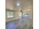 Open living space with new floors, fresh paint, recessed lighting, and lots of natural light at 741 Ellen St, Daytona Beach, FL 32114