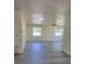 Spacious living room with modern floors, recessed lighting, and windows with lovely outdoor views at 741 Ellen St, Daytona Beach, FL 32114