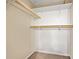 Walk-in closet with built in shelving and carpeted floor at 915 Stonybrook Cir, Port Orange, FL 32127