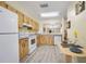 Spacious eat-in kitchen with modern appliances and ample cabinet space at 915 Stonybrook Cir, Port Orange, FL 32127