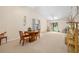 Large living room offering lots of natural light and backyard views at 915 Stonybrook Cir, Port Orange, FL 32127