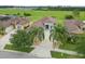 This beautiful home boasts well-manicured landscaping and mature palm trees, providing great curb appeal at 3345 Tesoro Cir, New Smyrna Beach, FL 32168
