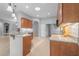 Spacious kitchen features granite counters, stainless appliances, and a convenient breakfast bar at 3345 Tesoro Cir, New Smyrna Beach, FL 32168