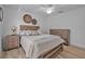 This bedroom features wood-look floors and a matching dresser and nightstand at 3615 Marisol Ct, New Smyrna Beach, FL 32168