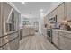 Spacious kitchen with stainless steel appliances, custom cabinets, and a breakfast bar at 3615 Marisol Ct, New Smyrna Beach, FL 32168