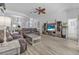 Spacious living room features modern decor, beautiful flooring, and comfortable seating at 3615 Marisol Ct, New Smyrna Beach, FL 32168