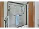 Modern bathroom with glass-enclosed shower and updated fixtures, providing a clean and stylish design at 3720 Willow Ave, Deland, FL 32720